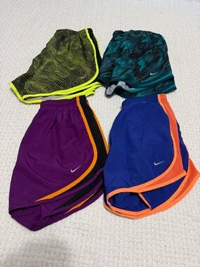 Nike set of 4 medium women’s running shorts.  Great condition!